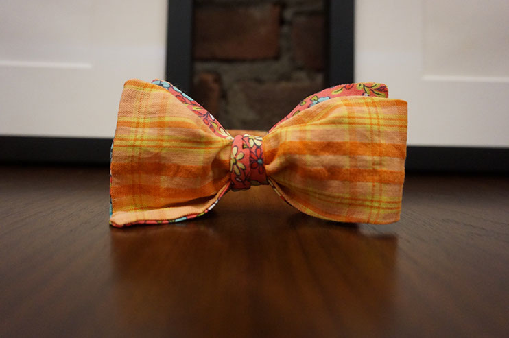 A Yellow/Black plaid combined with a Yellow and White Poppy flower print